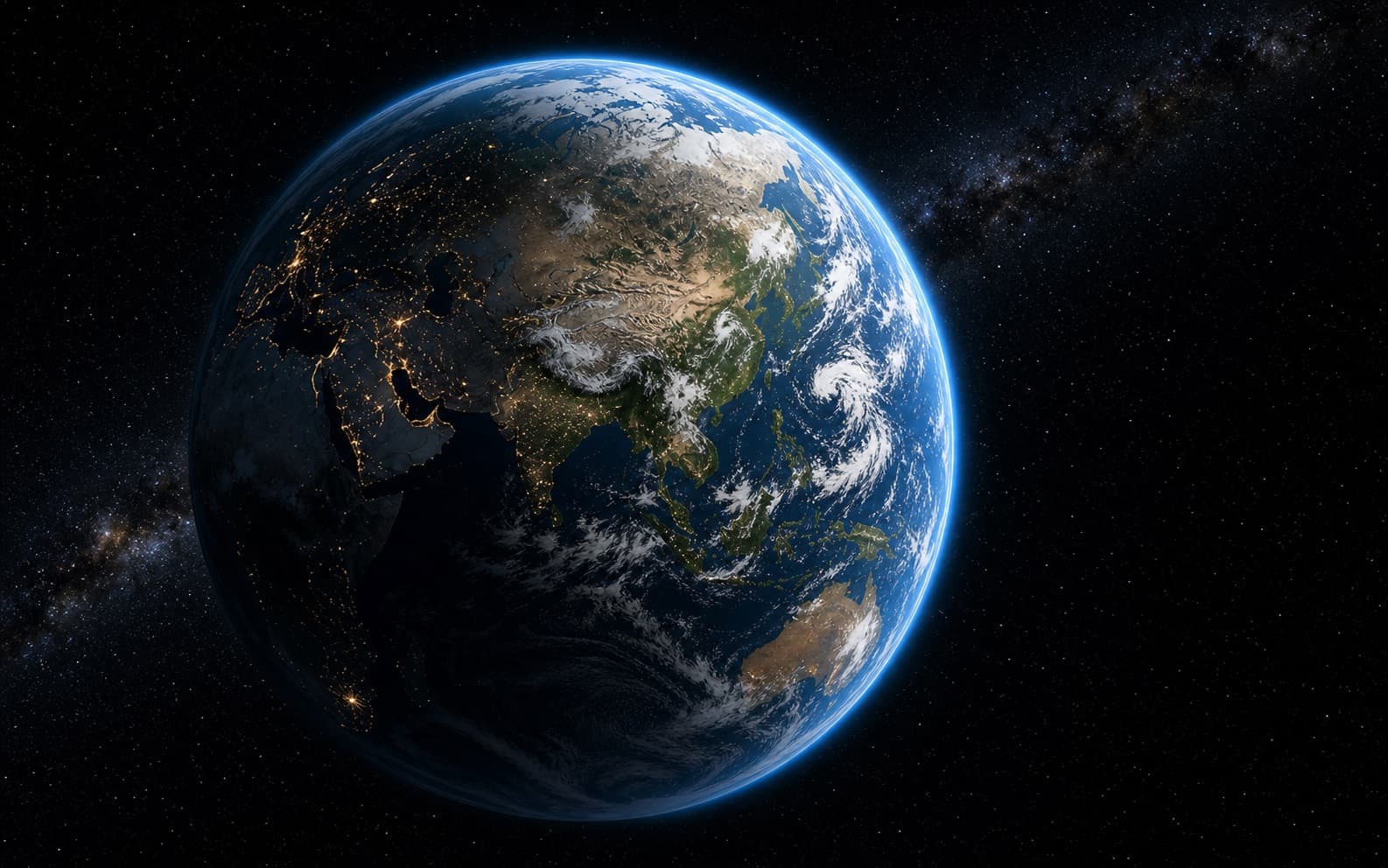 Earth seen from space with atmosphere, clouds, and city lights